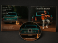 Christian Walker CD album cover and disc shown on a dark background, featuring a teal Chevrolet truck and a seated musician holding an acoustic guitar on the cover art.
